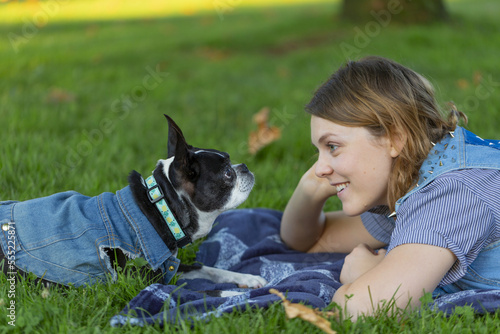 An owner delighting in a recovery dog, whose days are numbered; North Vancouver, British Columbia, Canada photo