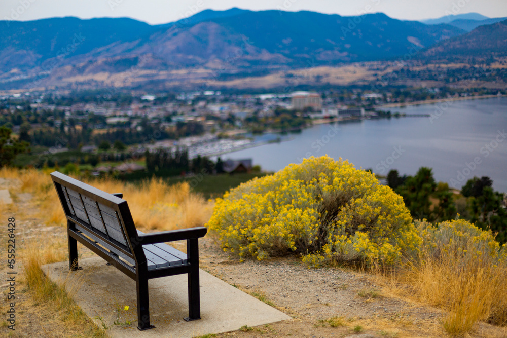 A bench on Munson Mountain with a view of Okanagan Lake and Penticton; Penticton, British Columbia, Canada A bench on Munson Mountain with a view of Okanagan Lake and Penticton; Penticton, British Columbia, Canada