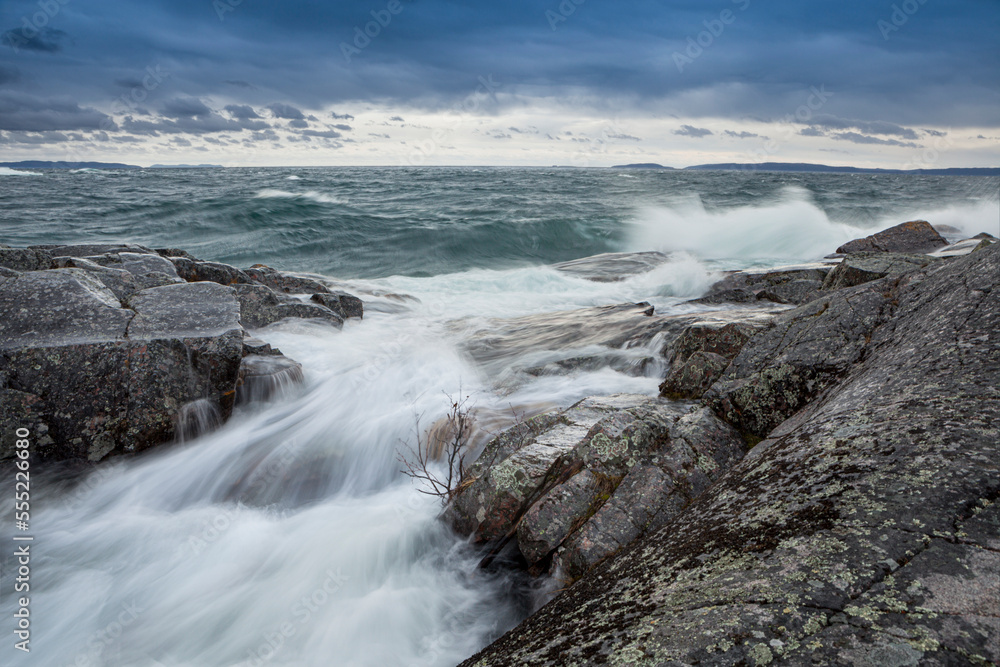 Surf flowing over rock on Lake Superior; Thunder Bay, Ontario, Canada Surf flowing over rock on Lake Superior; Thunder Bay, Ontario, Canada