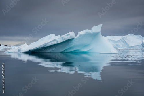 Reflection of iceberg in still water near Antarctica's Ciera Cove; Antarctica photo