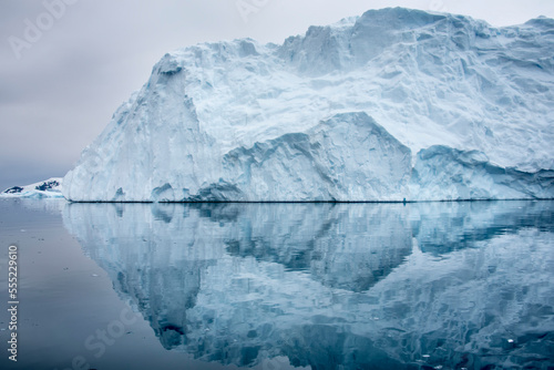 Reflection of iceberg in still water near Antarctica's Ciera Cove; Antarctica photo