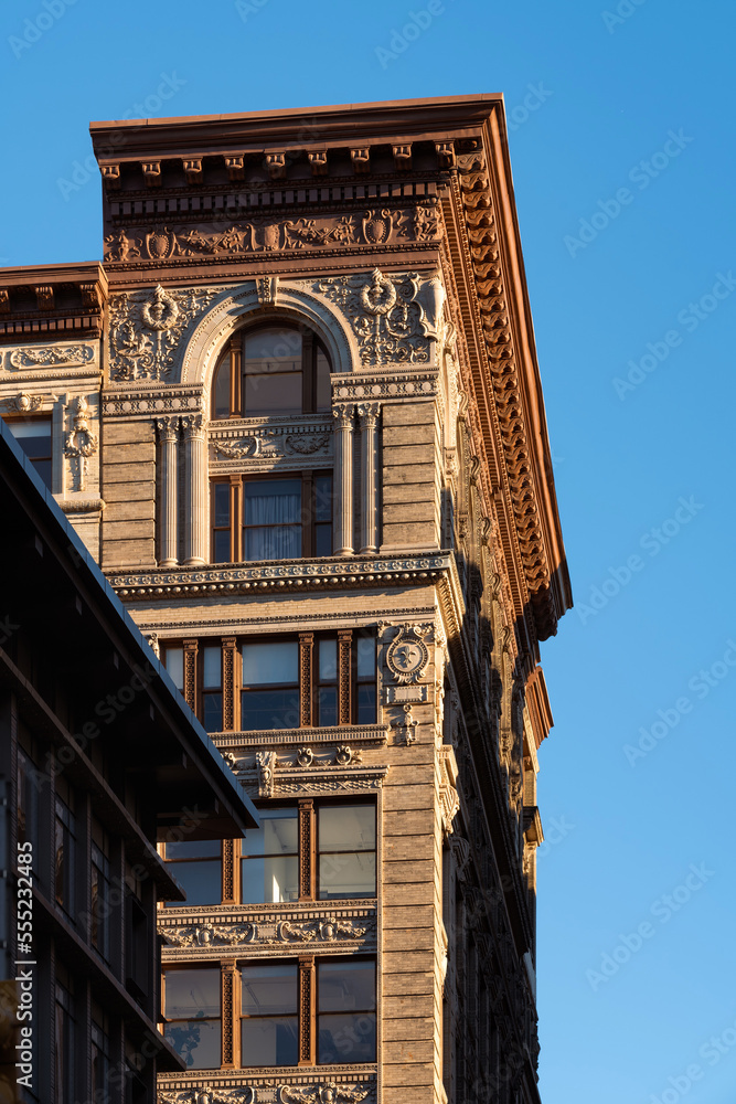 Fototapeta premium Soho loft buildings with intricate terracotta facade ornementation. Soho Cast Iron Building Historic District along lower Broadway, Lower Manhattan, New York City