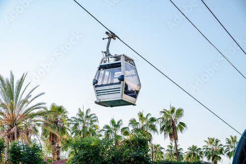 Funicular cab on background of sky and palm trees, close-up Fototapet