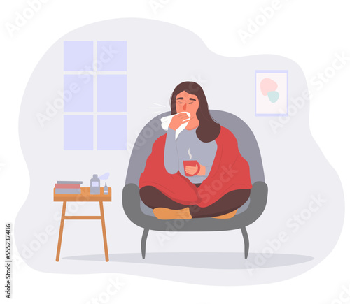 The girl is sitting at home in quarantine, sick, sneezing. A woman is being treated for a cold, drinks medicine, warms up with a hot drink. Vector graphics.