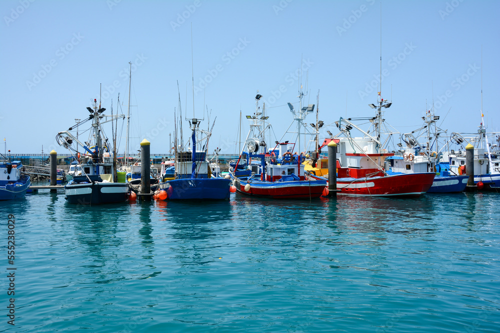 Colorful fishing boats in Los Cristianos Harbour, Tenerife, Spain