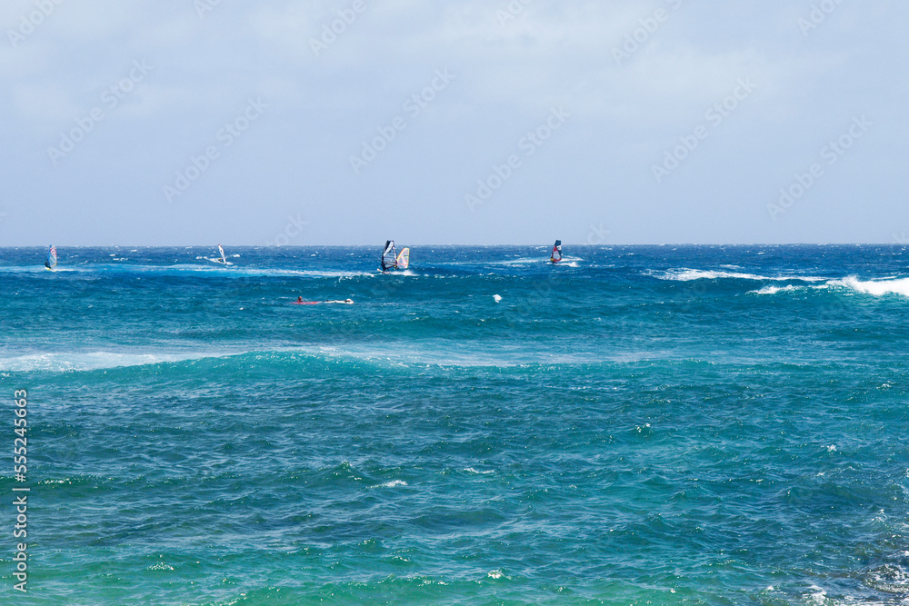 Wind surfing on the island's coast in the area of Costa Teguise