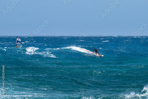 Wind surfing on the island's coast in the area of Costa Teguise