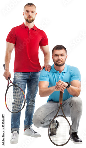 Two cheerful young men standing with sport tennis rackets