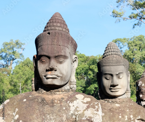 Sculptural stone group of guard soldiers at the gates of the ancient Angkor Wat is a temple complex in Cambodia