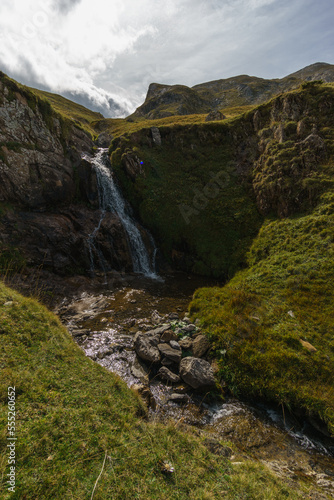 beautiful waterfall of small creek in Pyrenees Mountains, Col du Pourtalet, Nouvelle-Aquitaine France