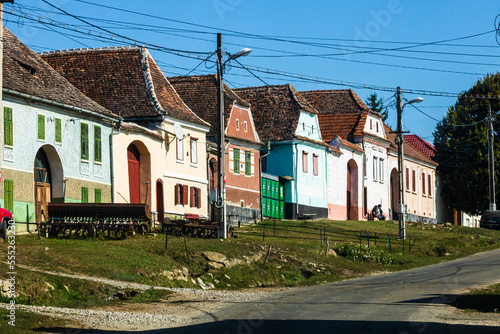 View of picturesque village Viscri in Romania. Painted traditional old houses in medieval Saxon village of Viscri, Romania, 2021
