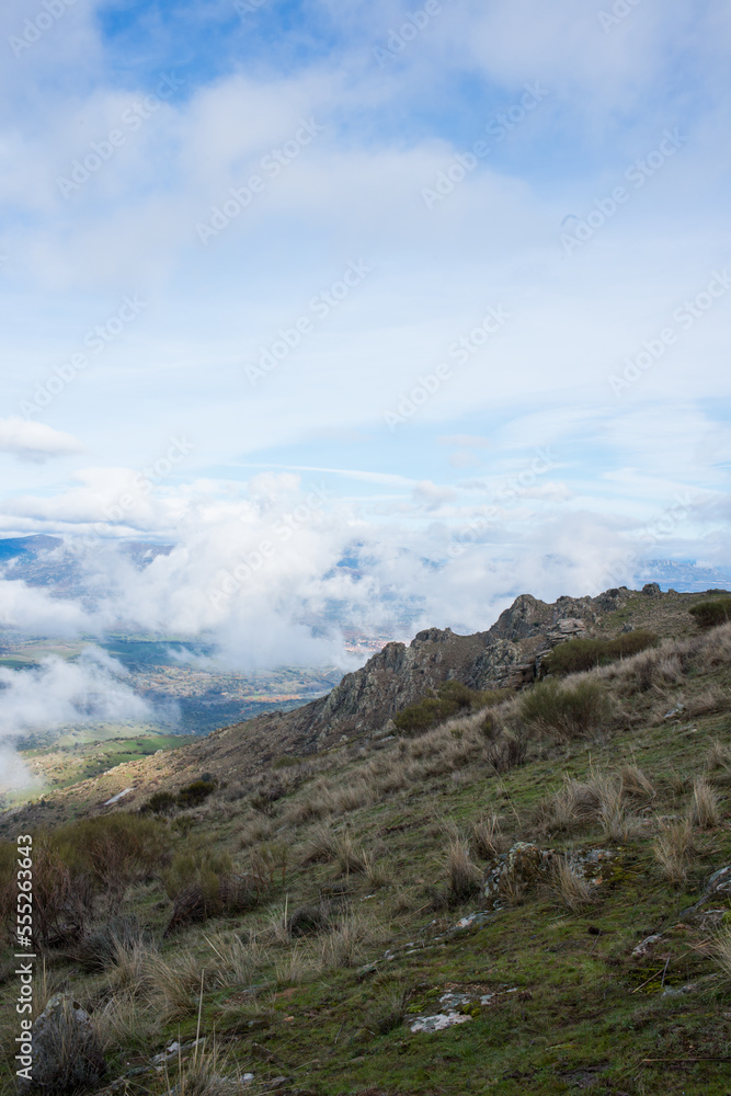 Beautiful landscape from a hill top.  Low clouds over the valley