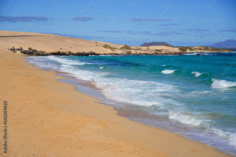 Moro beach in the Corralejo Natural Park in the north of Fuerteventura island in the Canaries, Spain - Waves in the Atlantic Ocean in winter