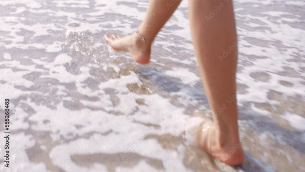 Walking, water and feet of a woman at the beach for freedom, holiday peace and summer travel in Bali. Wave, zen and legs of a girl in the ocean during a vacation to relax, traveling and stress relief Walking, water and feet of a woman at the beach for freedom, holiday peace and summer travel in Bali. Wave, zen and legs of a girl in the ocean during a vacation to relax, traveling and stress relief