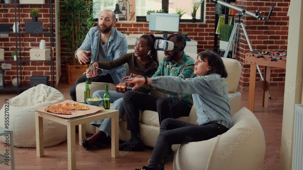 Diverse people losing video games play with vr glasses, feeling frustrated and sad about lost gaming competition. Using virtual reality headset on television console to lose game play. Diverse people losing video games play with vr glasses, feeling frustrated and sad about lost gaming competition. Using virtual reality headset on television console to lose game play.