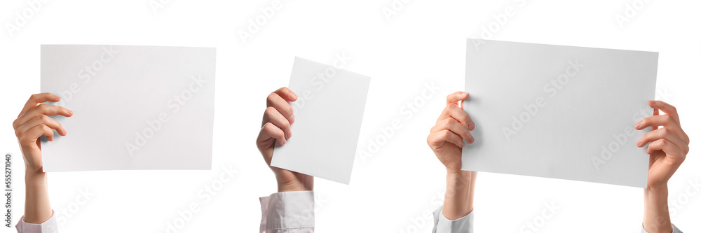 Set of female hands holding blank paper sheets on white background Set of female hands holding blank paper sheets on white background