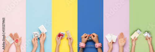 Female hands with different types of contraception on color background