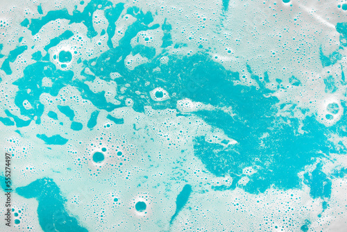 Color water with foam as background