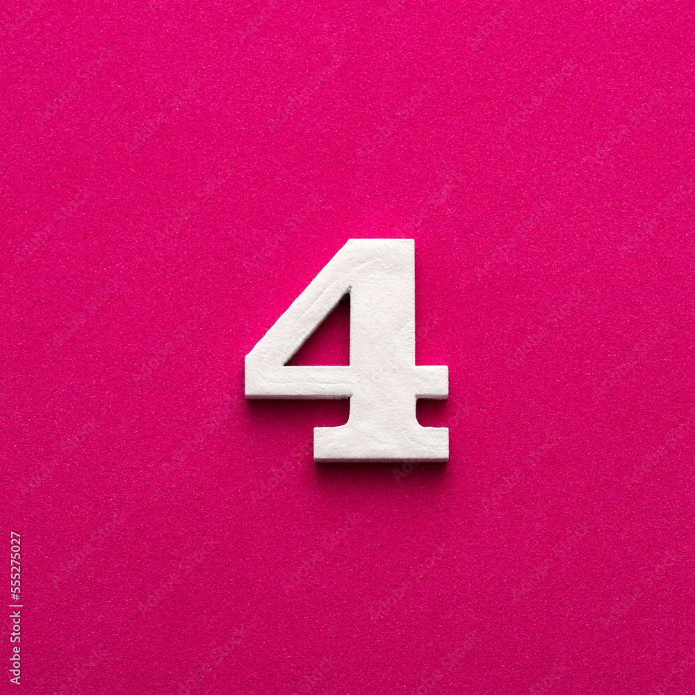 Number four - white number in wood on rhodamine red background Number four - white number in wood on rhodamine red background