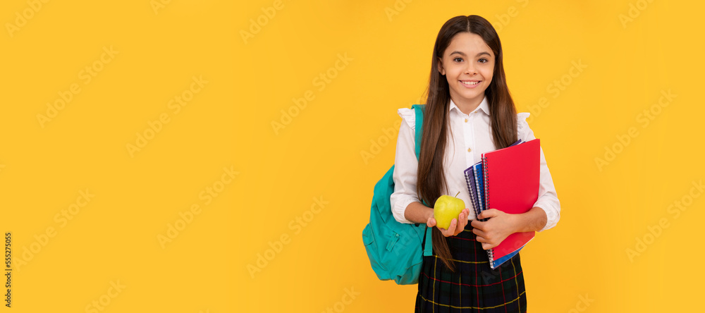 healthy childhood. happy kid going to do homework. Portrait of schoolgirl student, studio banner header. School child face, copyspace. healthy childhood. happy kid going to do homework. Portrait of schoolgirl student, studio banner header. School child face, copyspace.