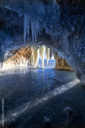 frozen waterfall in the cave at Grand Island on Lake Superior © csterken