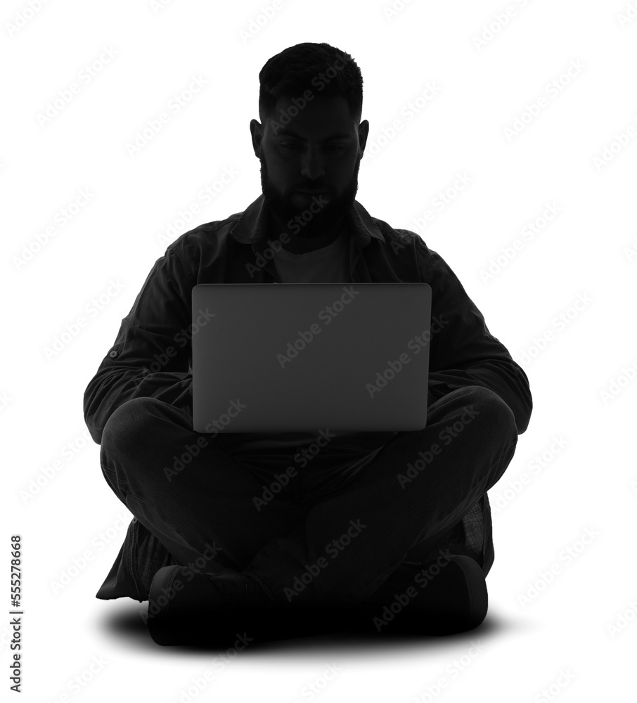 Silhouette of young man using laptop on white background Silhouette of young man using laptop on white background