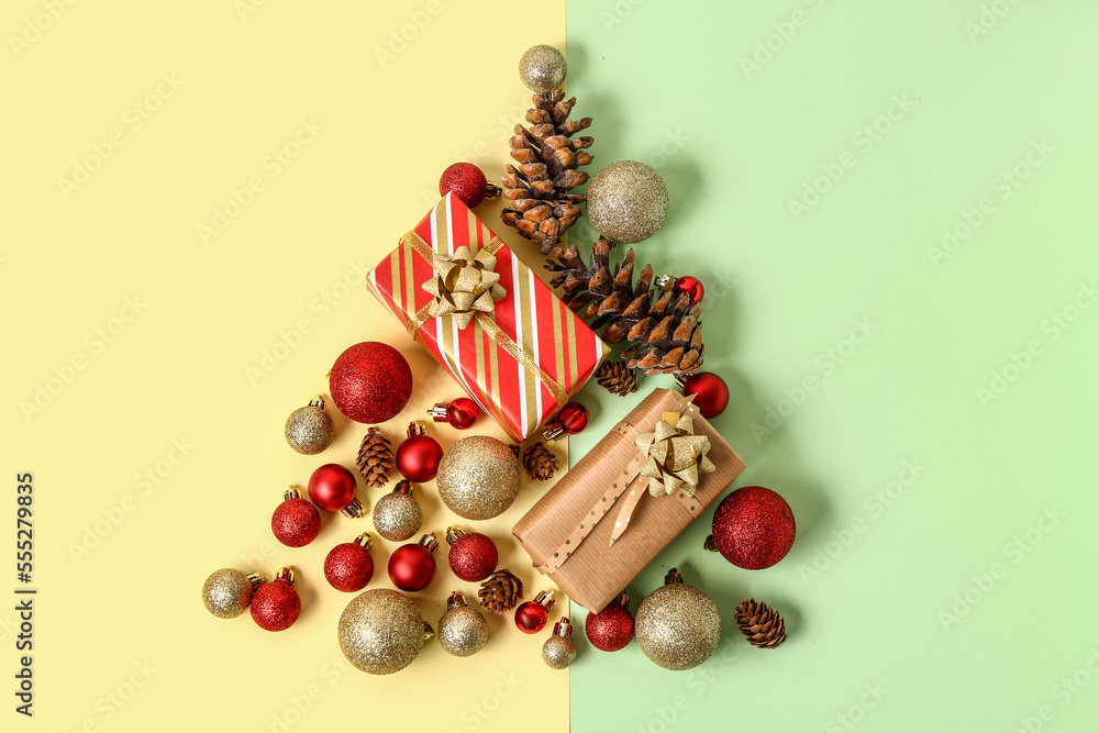 Christmas tree made of gifts and decorations on color background Christmas tree made of gifts and decorations on color background