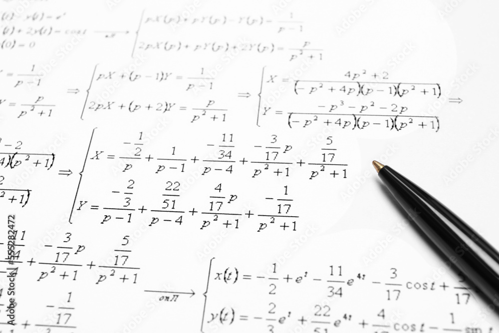Sheet of paper with mathematical formulas and pen, closeup Sheet of paper with mathematical formulas and pen, closeup