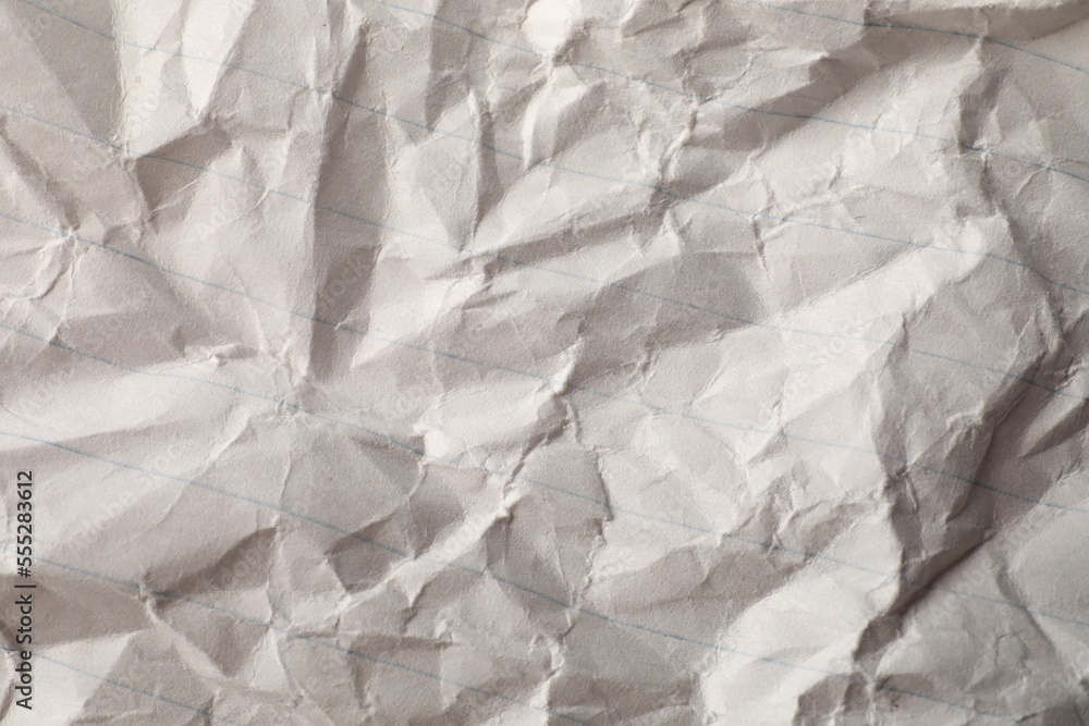 Fototapeta premium Crumpled sheet of paper as background, top view