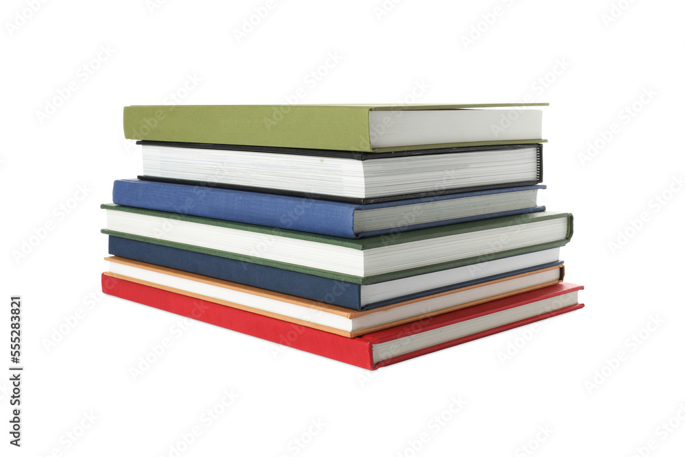 Many different books stacked on white background Many different books stacked on white background