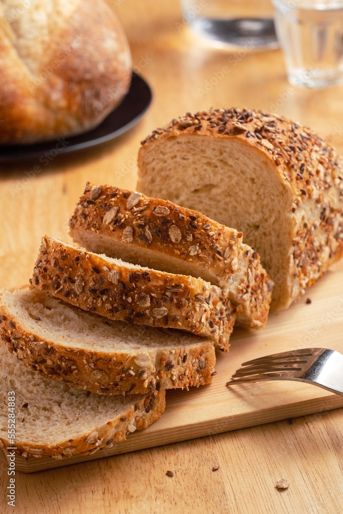 Healthy wholemeal bread on wooden table. Healthy wholemeal bread on wooden table.