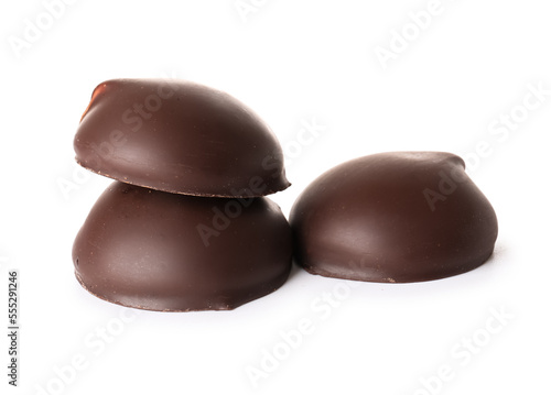 Chocolate bird's milk candies on white background