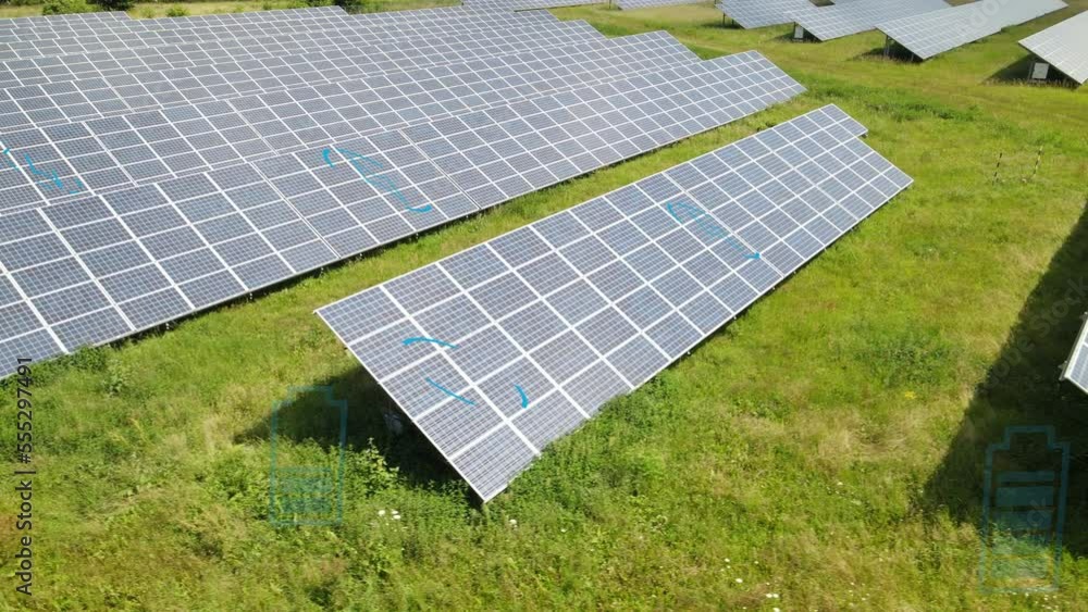Solar panels farm with animation graphics of flowing energy lines ...
