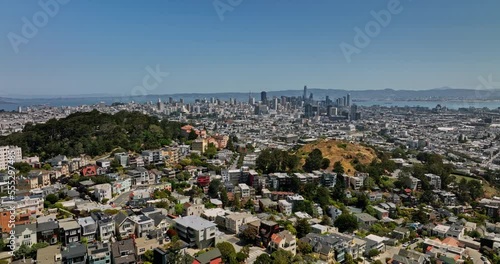 San Francisco California Aerial v150 cinematic low flyover buena vista, corona heights and lower haight neighborhoods with downtown cityscape in the background - Shot with Mavic 3 Cine - May 2022