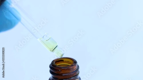 white liquid or raw material for skin care product, Serum products or natural chemical photo