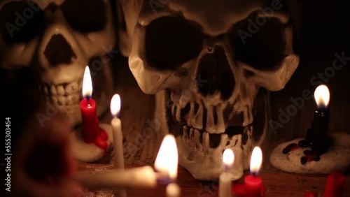 Skull and candlelight at night, religion and belief, magic or ritual