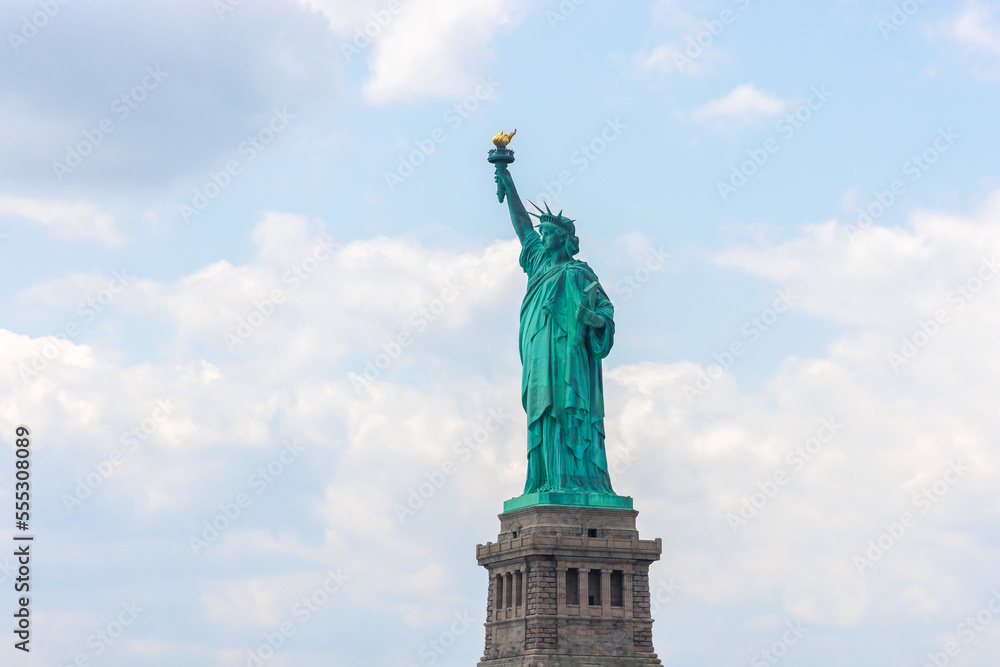 Fototapeta premium Located in middle of New York City, the Statue of Liberty is in front of you.