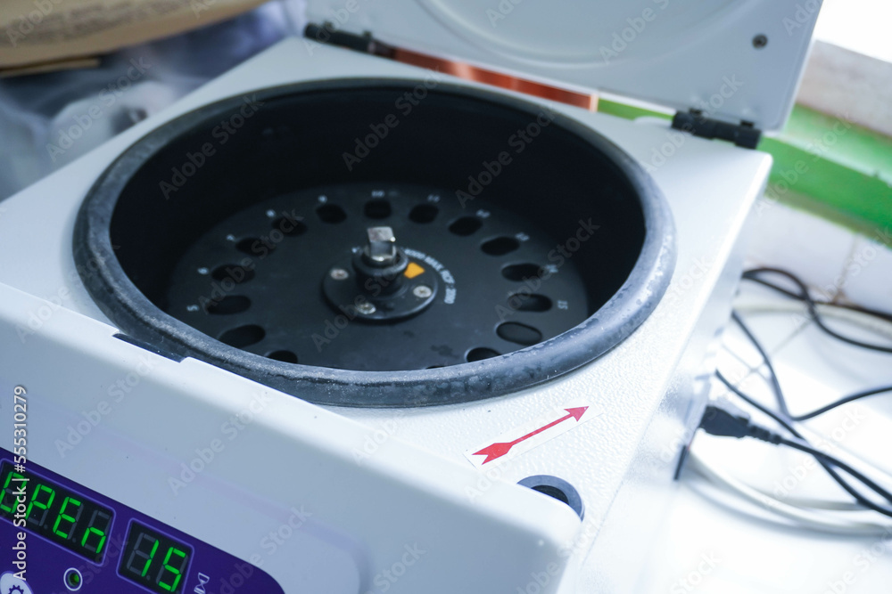 Laboratory equipment. Open laboratory centrifuge. White medical