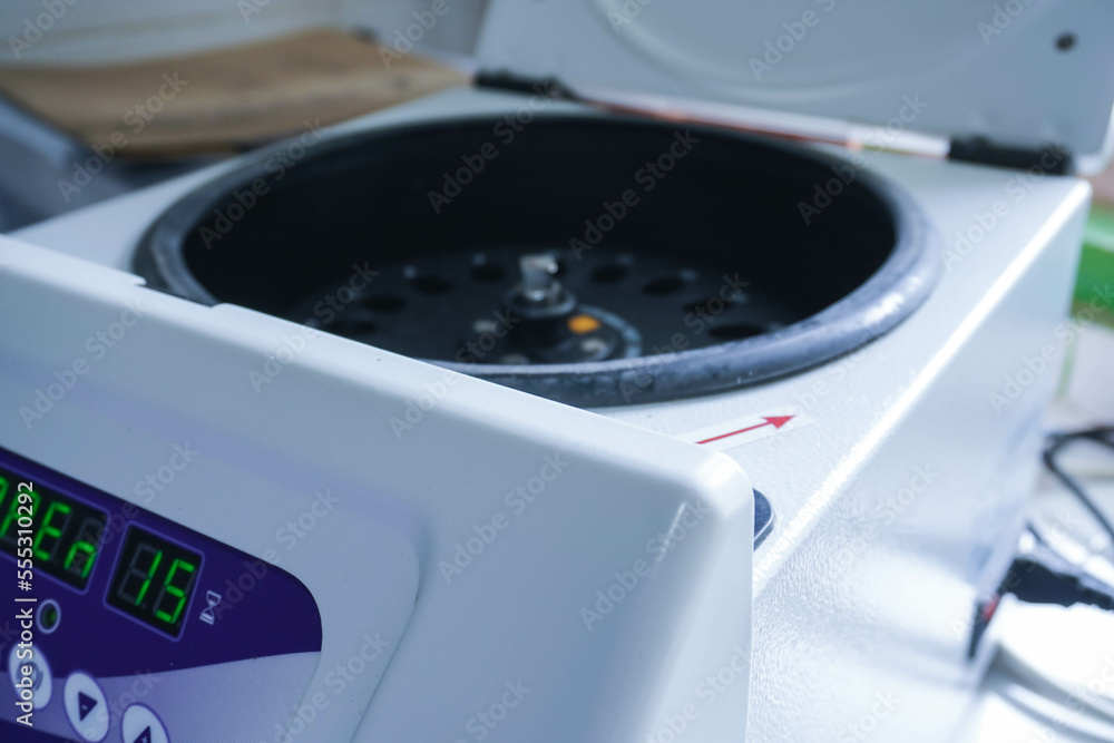 Laboratory equipment. Open laboratory centrifuge. White medical