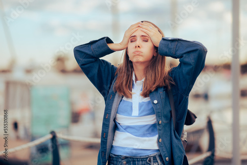 Stressed Woman Having a Bad Time During her Vacation . Exasperated tourist feeling lost and unhappy
 photo
