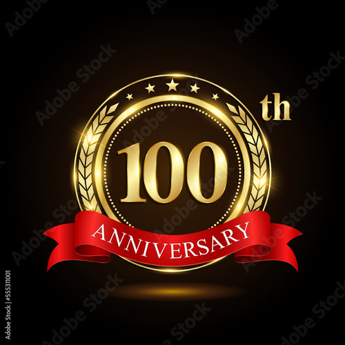 100th Anniversary. Golden Anniversary Emblem Design with shiny ring and red ribbon, Laurel wrath isolated on black background. Logo Vector Illustration