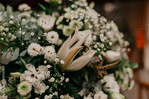 white flowers in wedding arrangement photo
