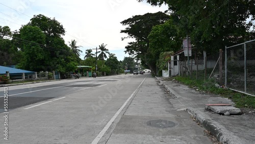 Wallpaper Mural Traditional Philippine concrete road. Cars and trucks rush to work. Torontodigital.ca