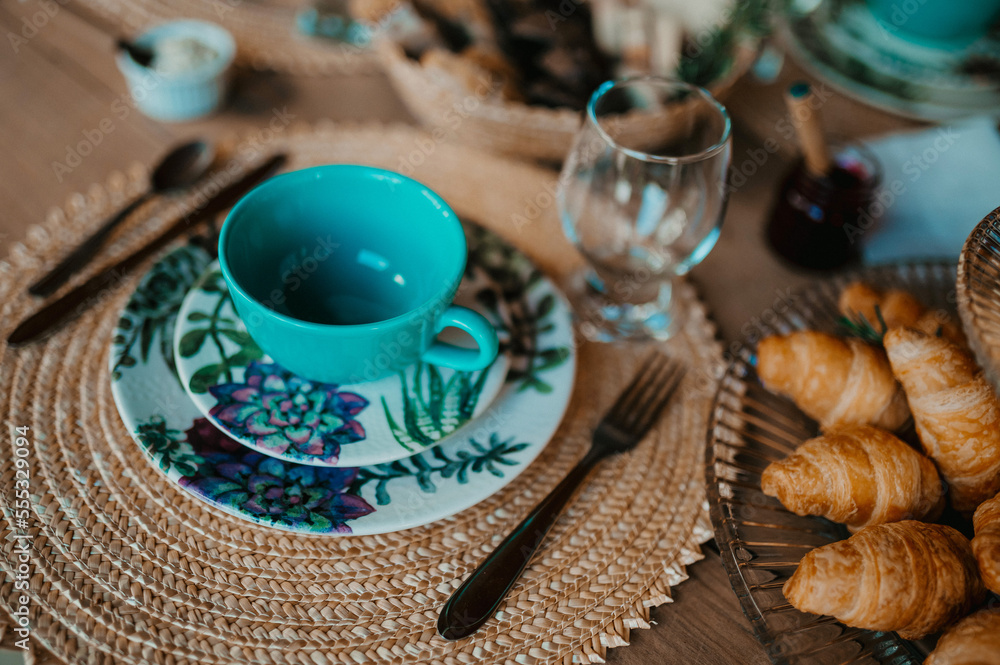 table set with food plates and cutlery table set with food plates and cutlery