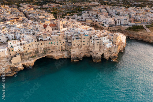 Aerial view of Polignano a mare at sunset in the province of Bari in Puglia. A country on the sea a wonderful landscape