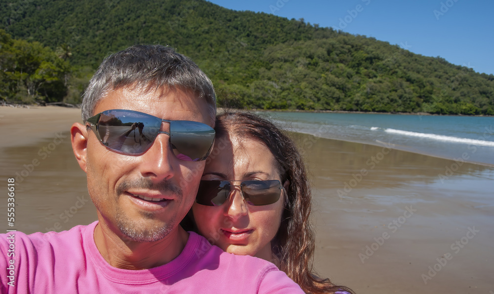 Selfie of a happy caucasian couple on vacation in a tropical beach Selfie of a happy caucasian couple on vacation in a tropical beach