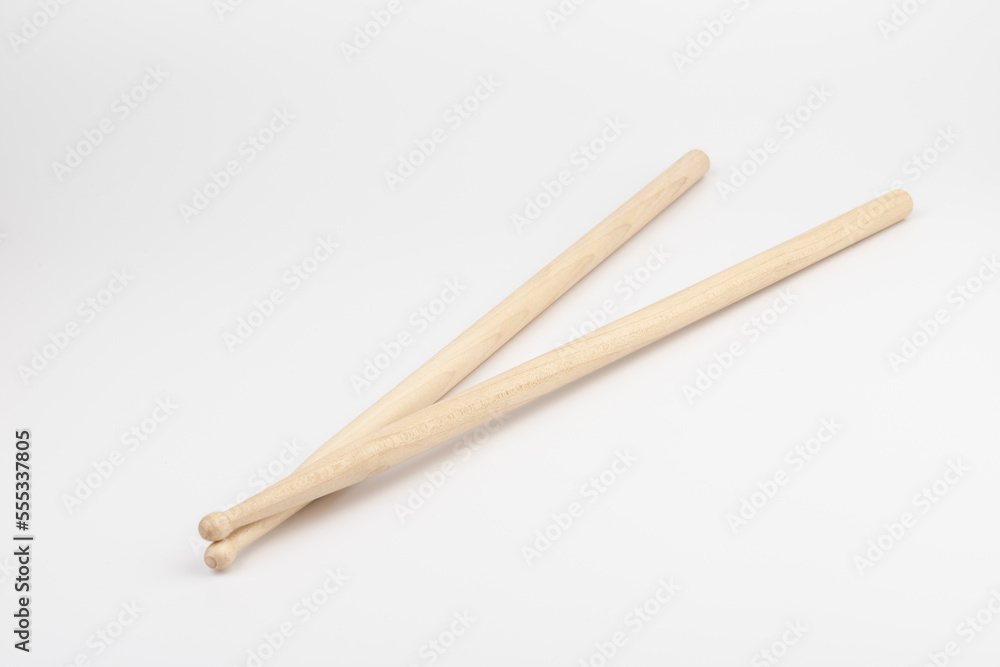 Wooden drumsticks isolated on white background. musical instrument. Wooden drumsticks isolated on white background. musical instrument.