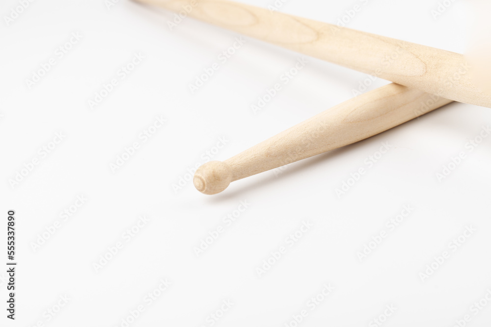 Wooden drumsticks isolated on white background. musical instrument. Wooden drumsticks isolated on white background. musical instrument.
