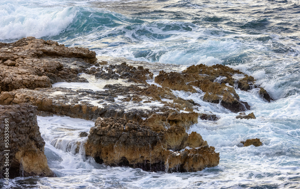 Rocky coast with waves on Mediterranean Sea. Italy, Europe. Nature Background. Rocky coast with waves on Mediterranean Sea. Italy, Europe. Nature Background.
