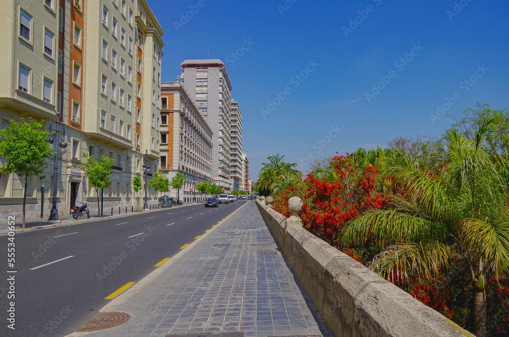Obraz premium Historic house facades old town and super modern clean building structures skyline landmarks in picturesque cityscape scenery in downtown Valencia, Spain in color or black white